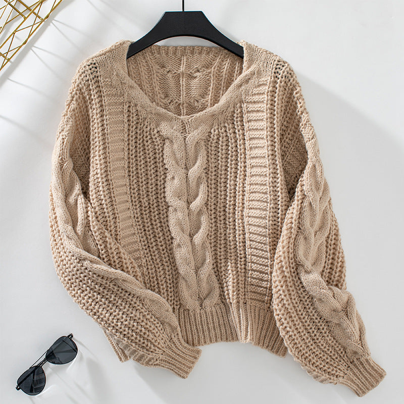 European Elegance: Solid Color Twisted Sweater